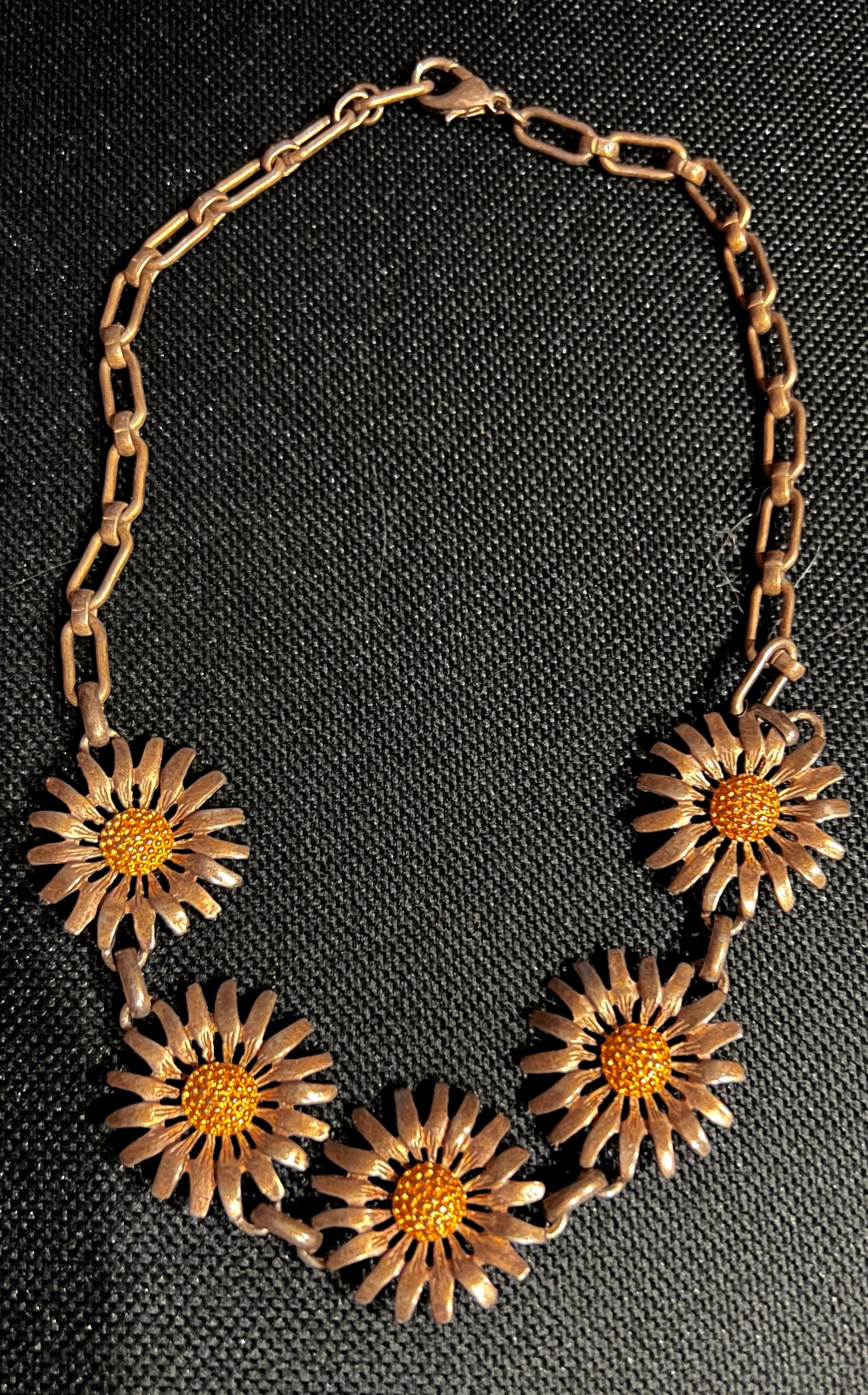 Vintage gold and yellow daisy necklace.